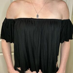 Black off the shoulder loose fitting top size M